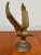 Vintage Solid Cast Brass Eagle with outstretched wings. It has some tarnishing, due to age and wear.