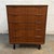 A Danish teak five-drawer chest by Ejsing Møbelfabrik, dating to the 1950s. The piece has a clean, compact form with warm...