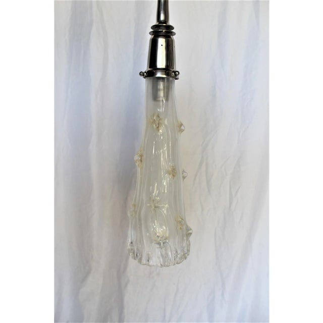 A Custom designed and made for an interior designer in LA. From Murano gold dust glass with pinched decorations. All metal...