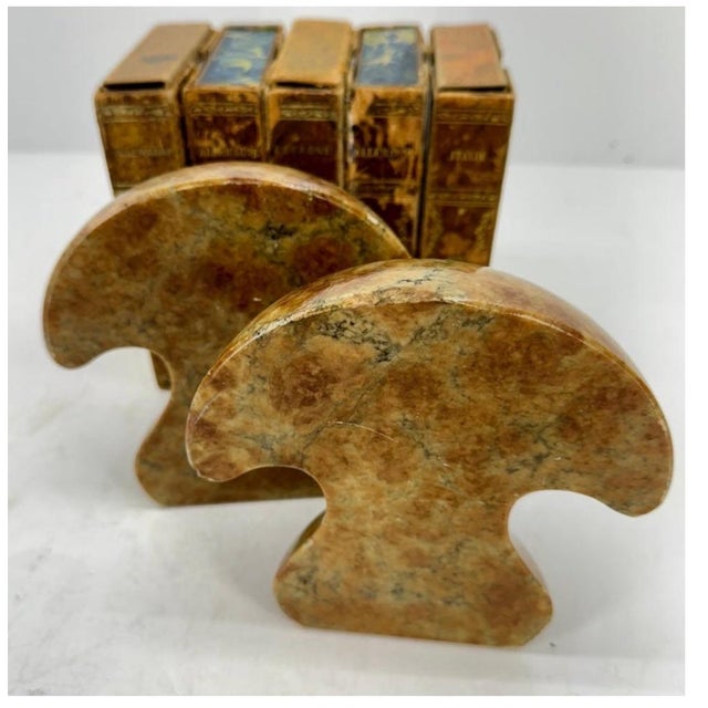 The mid-century Italian alabaster mushroom bookends are a stylish and unique decorative collectible for any book lover or...