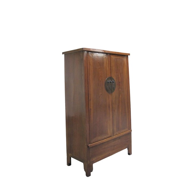 This 19th century armoire cabinet is built of solid elm using traditional Chinese joinery of tenon and mortise. The...