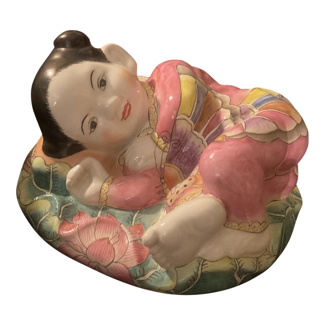 Vintage Ceramic Glazed Little Girl Figurine Resting on a Pillow For Sale