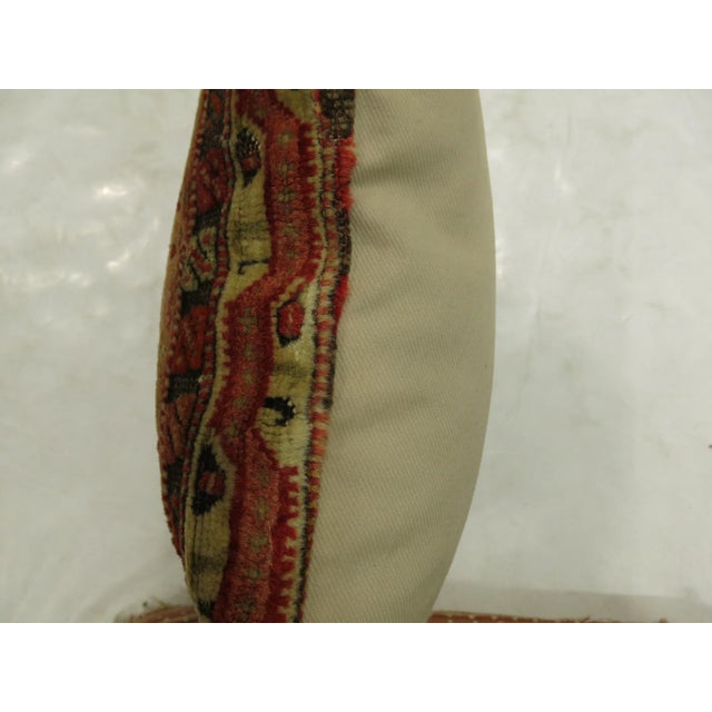 Pillow made from an angora Oushak rug. Zipper closure and foam insert provided.