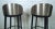 Pair of vintage industrial style stools featuring a stainless steel seat back, upholstered seat cushion, and sturdy metal...