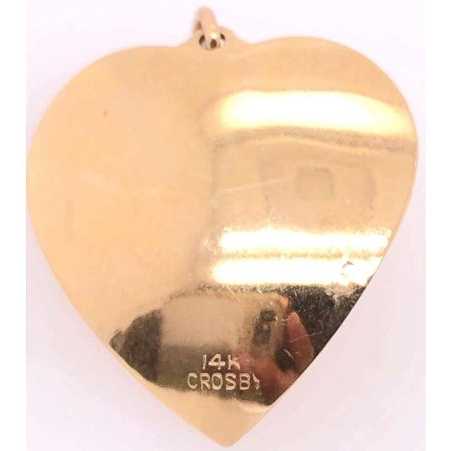 14 Karat Yellow Gold Heart Pendant with Pearl. 3.55 grams total weight.