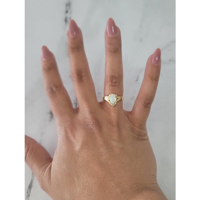 ♥ Product Summary ♥ Stone: Australian Opal & Diamonds Band Material: 14k Yellow Gold Weight: 4 grams Dimensions: 11mm...