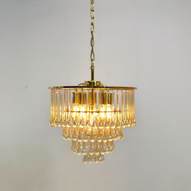 Mid-Century Teardrop 4-Tier Chandelier from Palwa, 1970s, in Flawless conditions. Designed 1970 to 1979 This piece has an...