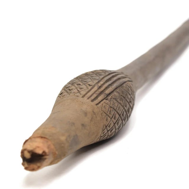 A staff or spear from the Dogon who live at the base of the Bandiagara escarpment near the Niger River in Mali. This...