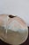 A pebble-form vase in porcelain by virebent, the toulouse manufactory, made in france in the 1970s. The flattened body is...