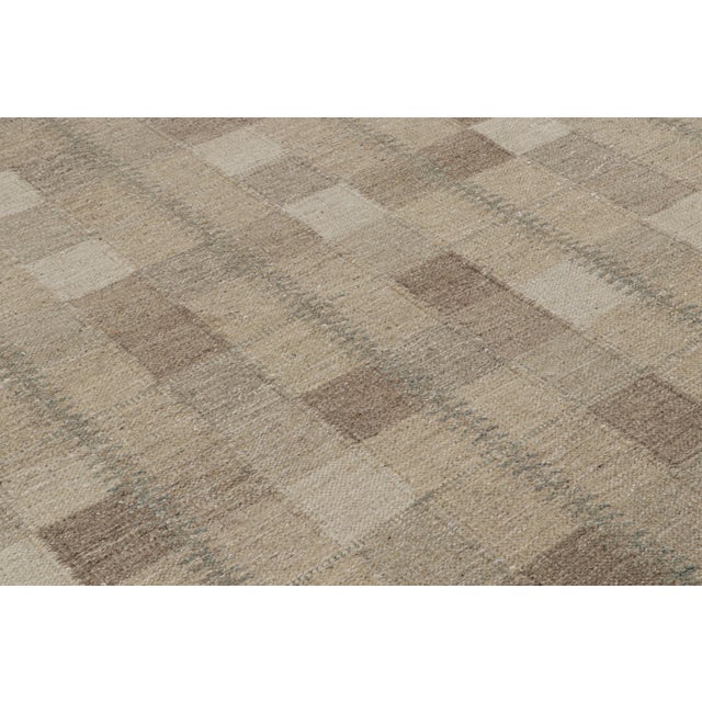 Evoking the bold creativity and tactile richness of mid-century Swedish design, this modern Rya rug is a masterful...