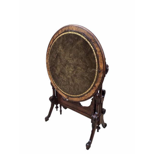 Antique Victorian Eastlake Round Tilt-Top Games Table with Tooled Leather Top, Dated 1873 An exceptional antique Victorian...