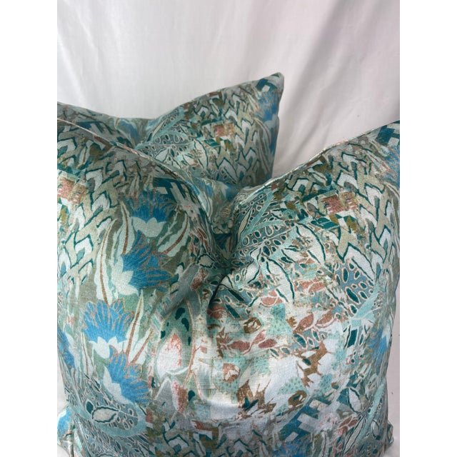 Custom pair of 22” pillows covered in S. Harris "Borneo" in color aqualine, a luxe printed velvet in aqua,teal, and green....