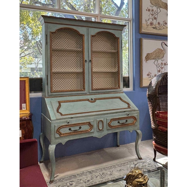 Minton Spidell Louis XV Secretary. Features richly carved details with a flip-down writing surface fitted with drawers and...