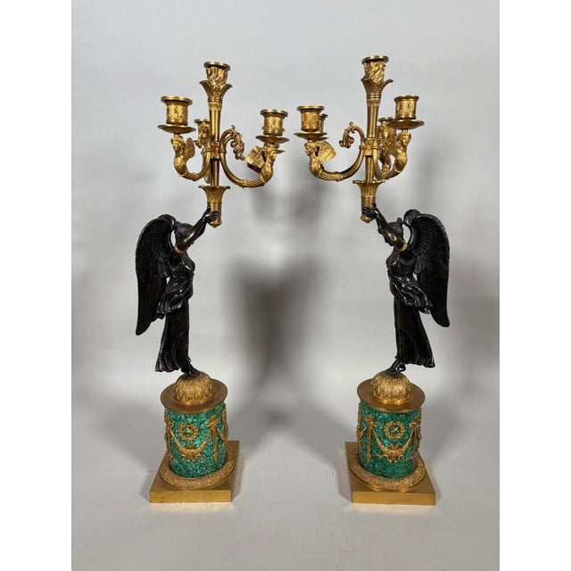 A pair of five-flame winged Victory candelabra. Empire style. Attributed to Pierre-Philippe Thomire (1751-1843) . Finely...