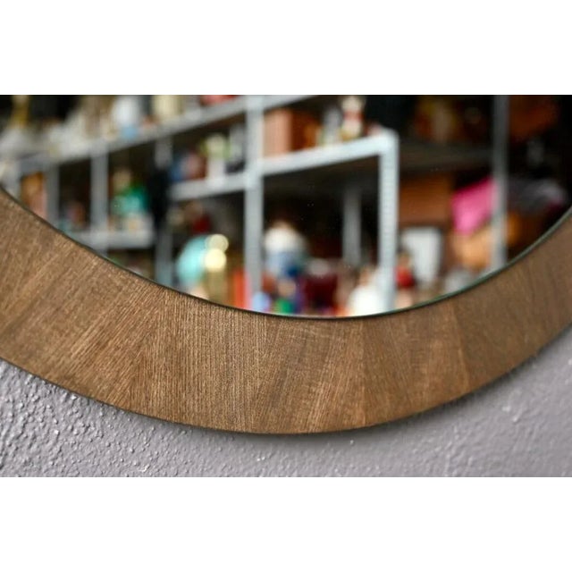 with its Scandinavian design and more than generous dimensions, this mirror with geometric shapes is of touching...