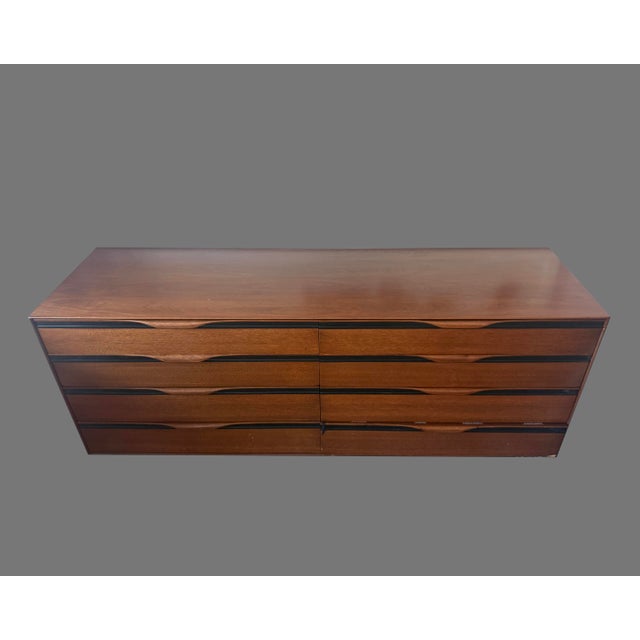 This is a circa 1960's John Kapel for John Stuart Inc. walnut low top dresser. It has some blemishes but is in good...
