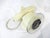 A telephone designed in the manner of an early airplane with rotary dial to the front and a clear Lucite ring making it...