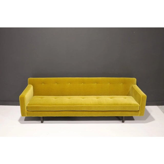 Beautifully updated and restored, the iconic bracket back sofa by Edward Wormley for Dunbar is a true masterpiece of mid-...