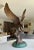 Bronze eagle (after Edward Chope) on a marble base, circa late 20th century. The bronze sculpture depicts a majestic bald...