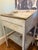 An exceptional antique primitive merchant’s counter featuring a beautifully weathered original white painted finish, a...