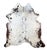 This natural speckled cowhide rug features unique brown and black "salt and pepper" markings on a white ground. Every...