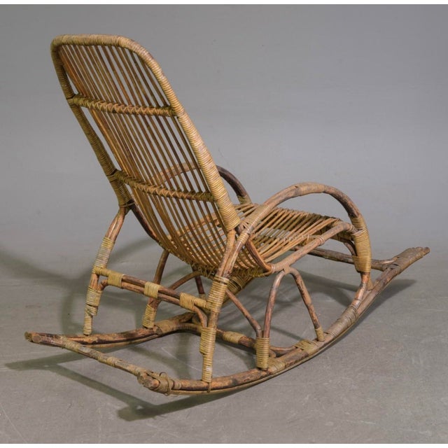French Wicker Rattan Rocking Chair - 42.5 in tall x 22.5 x 55 with a seat height of 16.5 inches