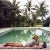 Having A Topping Time 1959 by Slim Aarons Slim Aarons Limited Estate Edition Socialite Alice Topping relaxing at a...