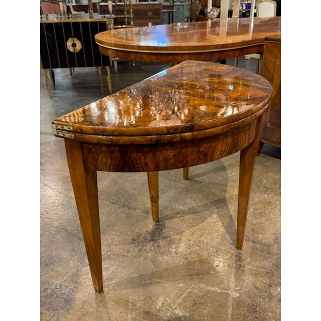 Fine 19th century German walnut Biedermeier demi-lune flip top console. Biedermeier furniture (circa 1815–1848) is known...