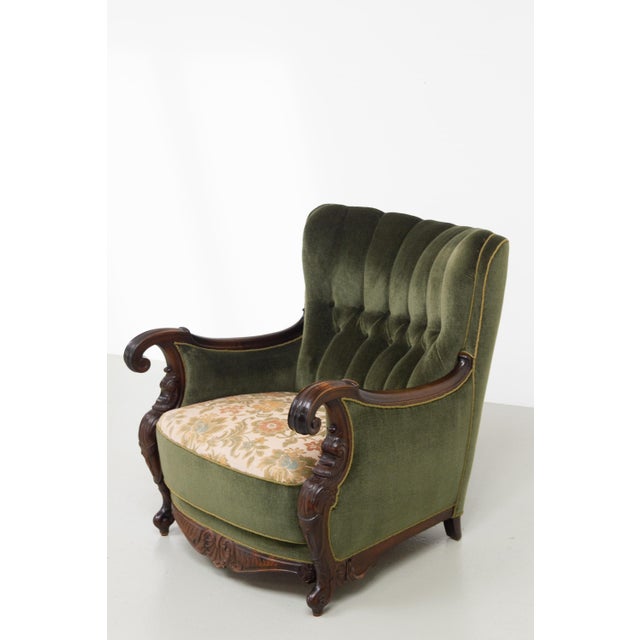 Danish Carved Lounge Chair in Green Velvet, 1920s. A rare and gorgeous antique armchair in a rich dark green velour....