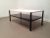 This Regal coffee table was designed by Wim Rietveld in 1960 and produced by Ahrend de Cirkel. The frame is made of a...