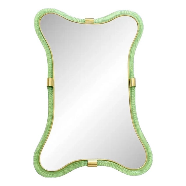 Impressive and scenographic wave mirror in green- wather “torchon” torciglione murano glass. exclusive design by simoneg,...