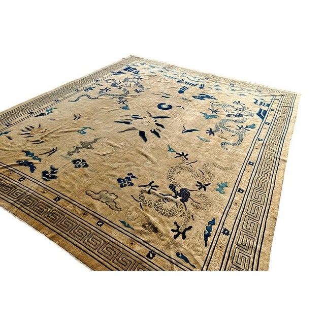 This nineteenth-century Peking carpet from China is a monumental and highly symbolic "Imperial-style" textile,...