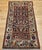 "This exquisite early 20th-century Persian Malayer rug showcases an allover Herati geometric pattern woven in a deep navy...