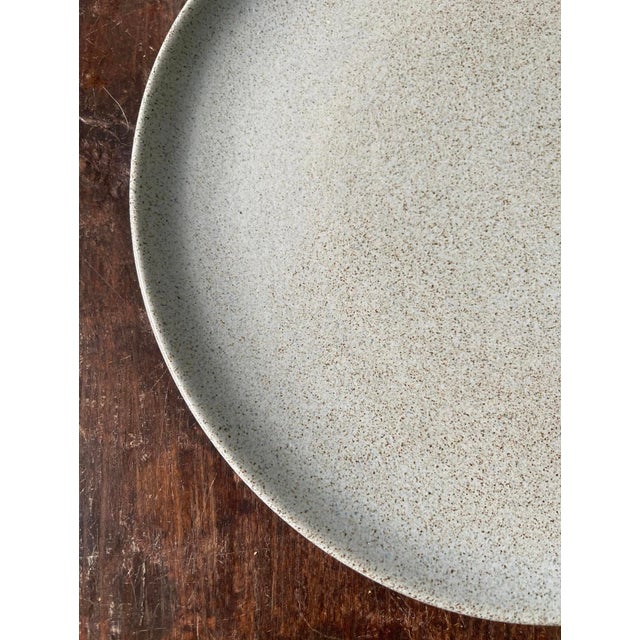 Amazing set of 14 plates by the highly coveted Heath Ceramics out of Sausalito California. It is a rare opportunity that I...