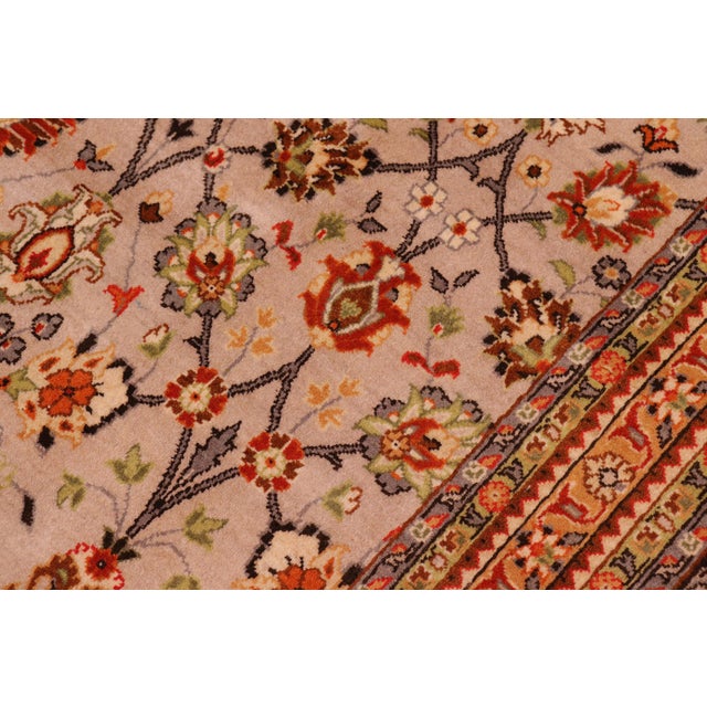 Designed with mesmerizing intricacy and gorgeous color palette, this hand-knotted masterpiece demonstrates the beauty and...