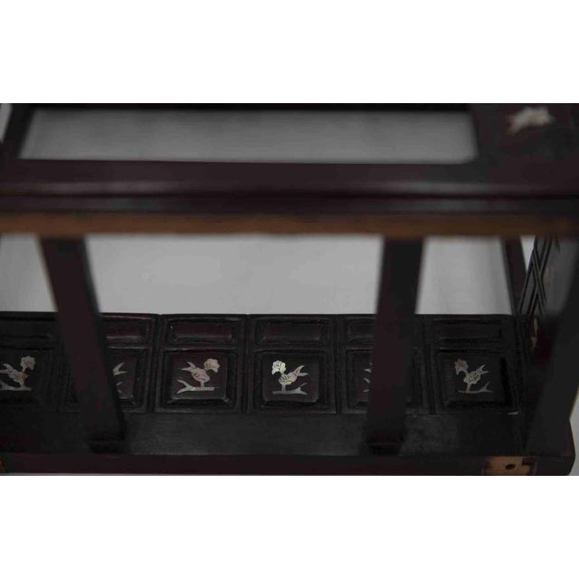 Finely crafted miniature display stand in dark hardwood, likely hongmu, realized during the late Qing Dinasty (end of 19th...