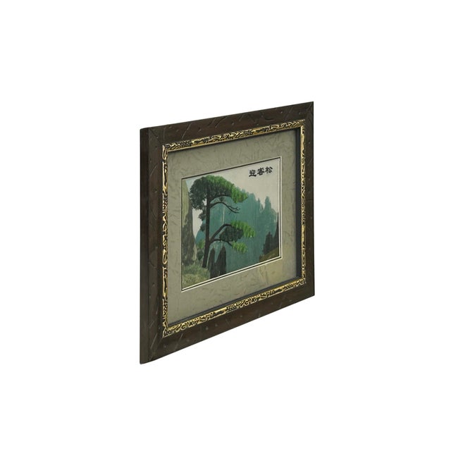This artwork is a fine example of Chinese silk ribbon or thread embroidery, utilizing a raised-stitch technique to create...