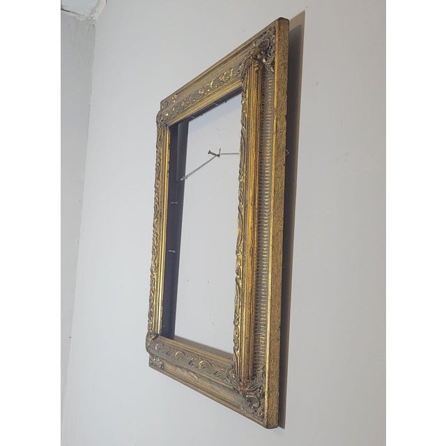 Lovely gilt wood frame with gesso details. Wired for vertical hanging, but can be changed easily. Accommodates a 14 x 11"...