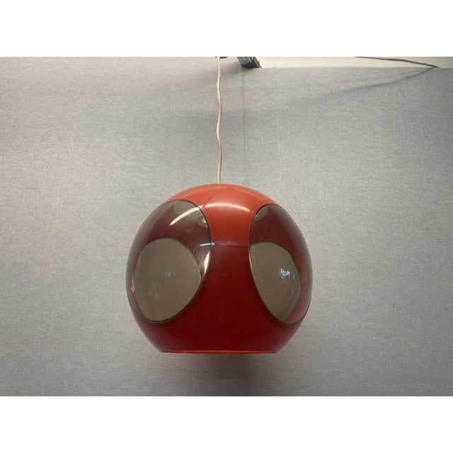 Vintage Colani Ufo Ceiling Lamp in Red Plastic from Massive, 1970s, in Good conditions. Designed 1970 to 1979 I have...