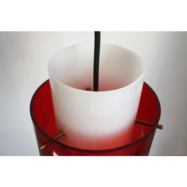 Italian pendant light from the 1950s/60s by Goffredo Reggiani. Two acrylic glass cylinders: one white, the other, wider,...