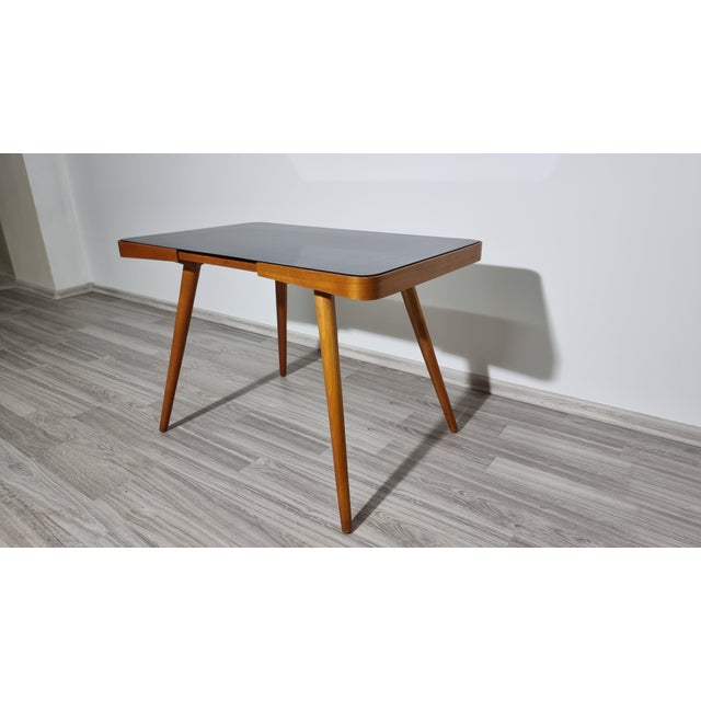 Coffee Table by Jiri Jiroutek, Interior Prague, 1960s, in Good conditions. Designed 1960 to 1969 This piece has an...