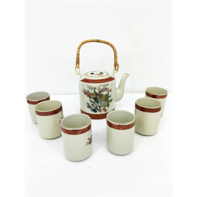 The Satsuma Peacock 1979 Teapot and 6 Cups from Japan embody the essence of traditional Japanese artistry. Crafted with...