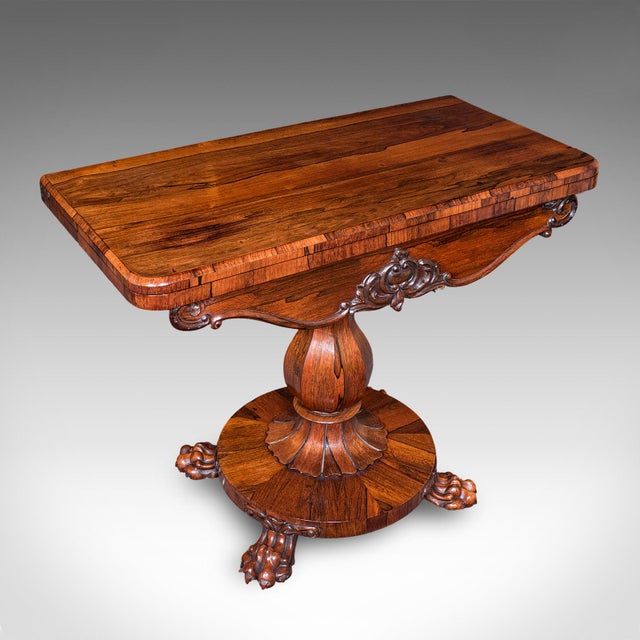 This is an antique club lounge poker table. An English, rosewood fold-over games or card table, dating to the William IV...