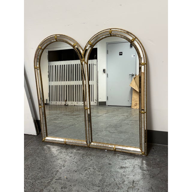 Design Plus Gallery presents a Vintage Hollywood Regency Double Arched Wall Mirror. Two adjoining arched mirror panels...