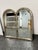 Design Plus Gallery presents a Vintage Hollywood Regency Double Arched Wall Mirror. Two adjoining arched mirror panels...