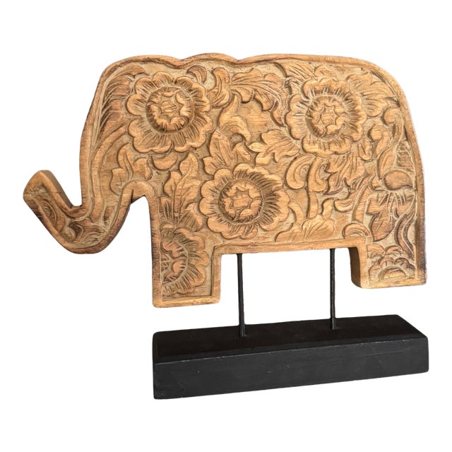 Hand-Carved Floral Wood Elephant Sculpture on Black Wooden Stand For Sale