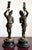 This pair of cast metal knight figures exudes old-world grandeur, each standing tall in intricately detailed armor with a...