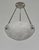 NOVERDY A French 1930s art deco pendant light in nickel plated solid brass holding a bowl in clear frosted molded-pressed...