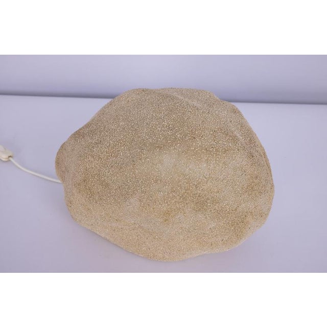A rare and highly desirable “dora” moon rock lamp by andré cazenave , italy, dating from the 1970s. This example stands...