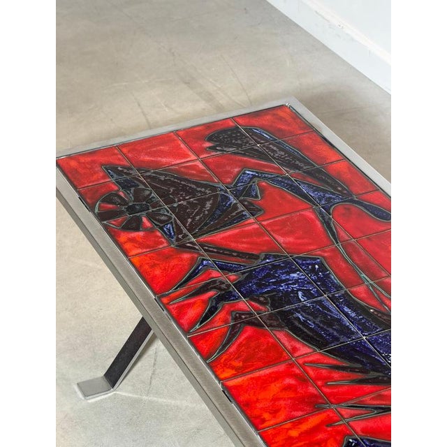 A striking vintage coffee table designed by André Bayer, featuring the designer’s iconic hand-glazed ceramic tile...